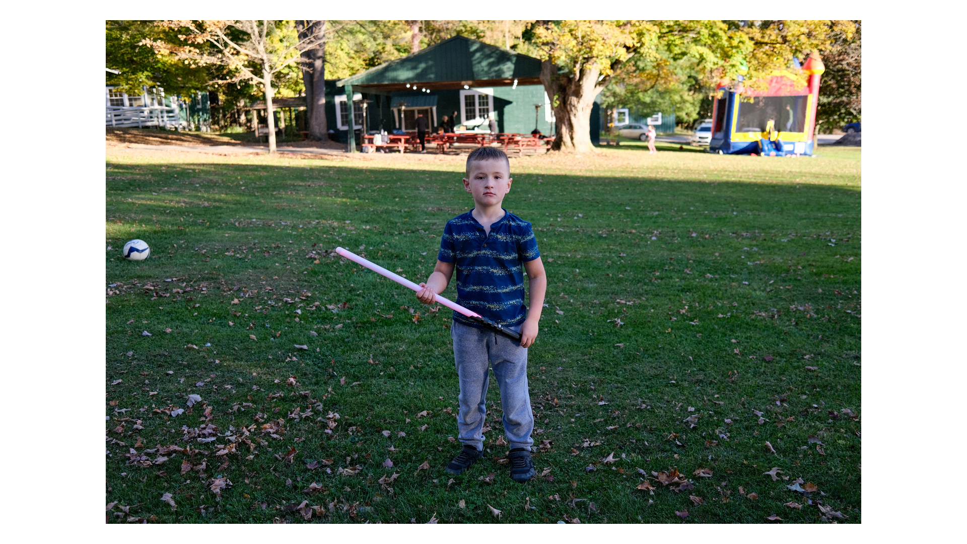 ‘Boy with a Lightsaber in a Field’. Copyright by Nathaniel Phillips.